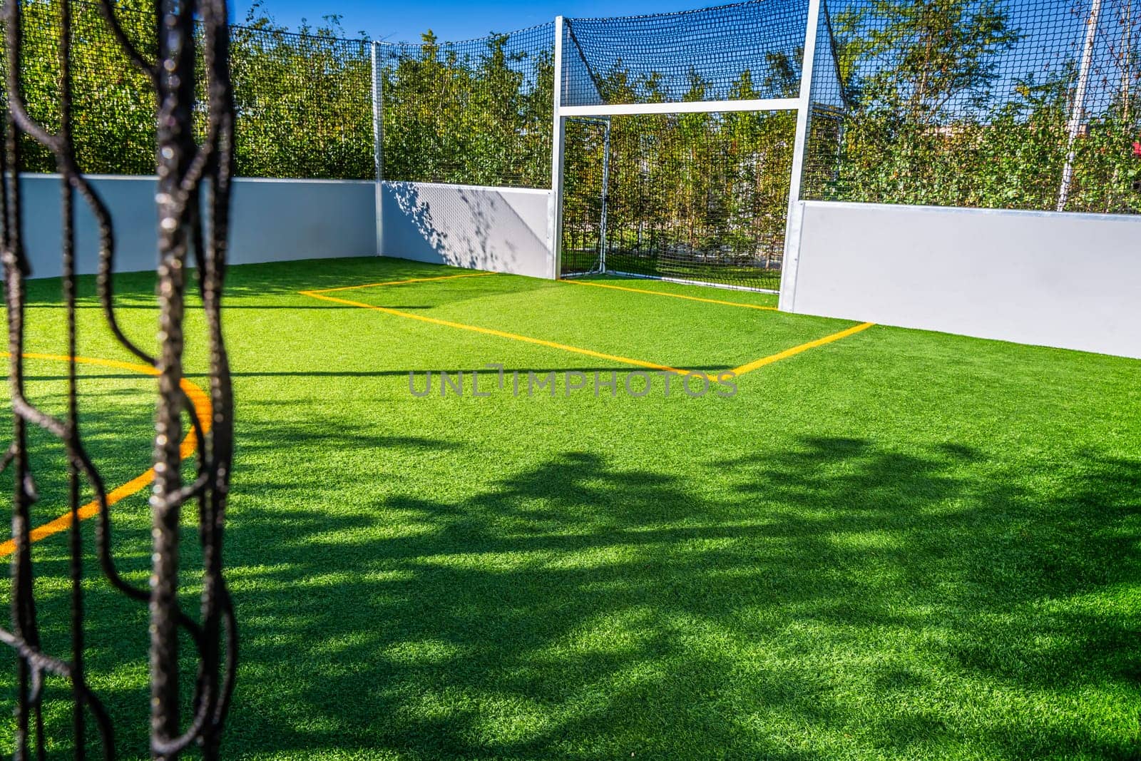 Playing field for small garden with artificial lawn, synthetic turf playing field, artificial grass pitch