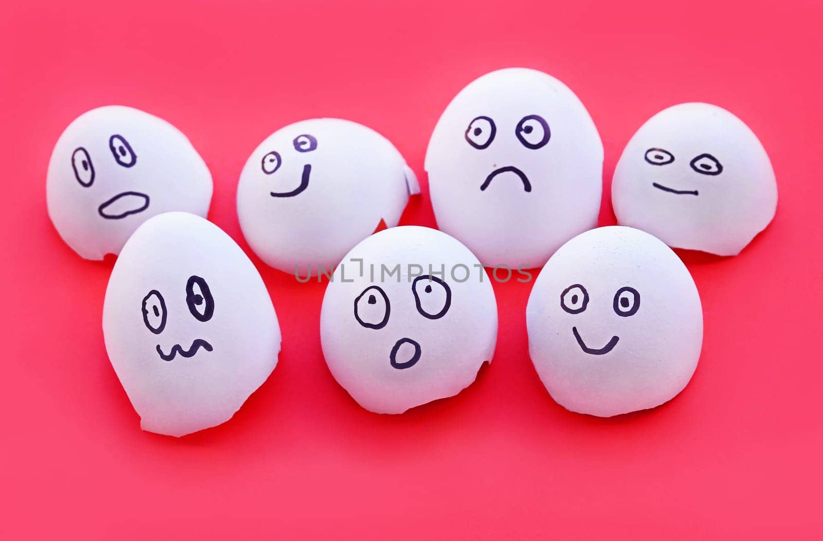 Eggshells with painted faces with different emotions