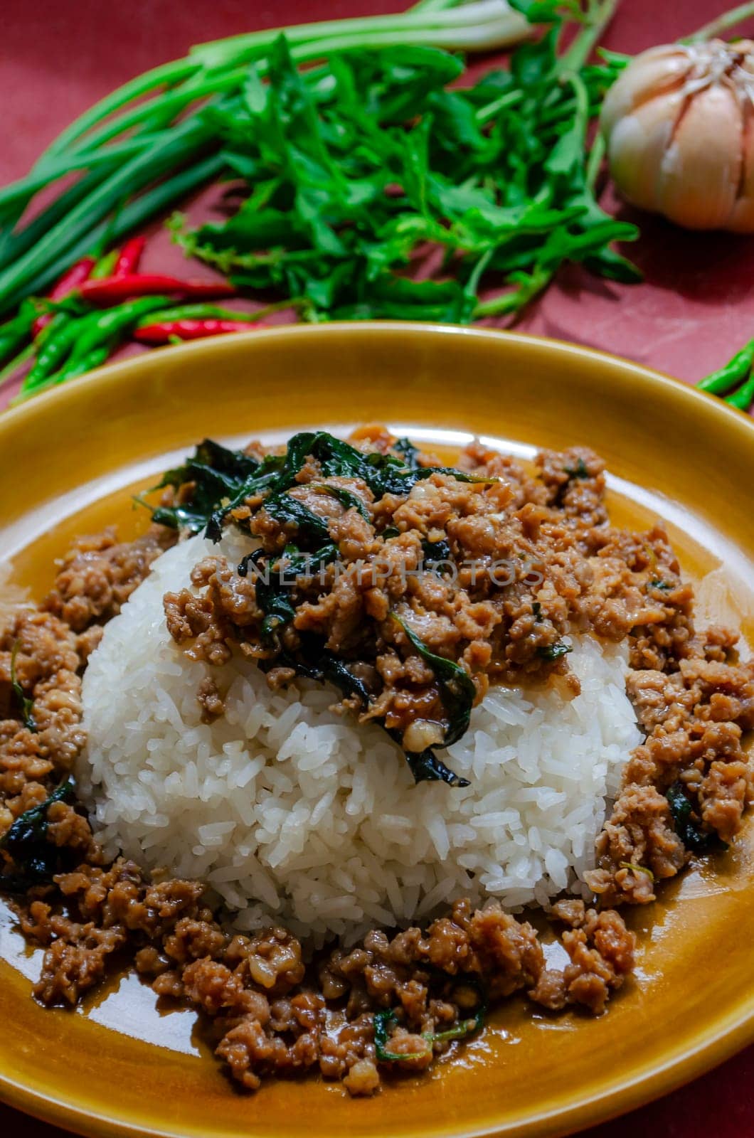 Minced pork with basil over rice is a Thai food that is popular among Thai people because it is delicious and easy to eat