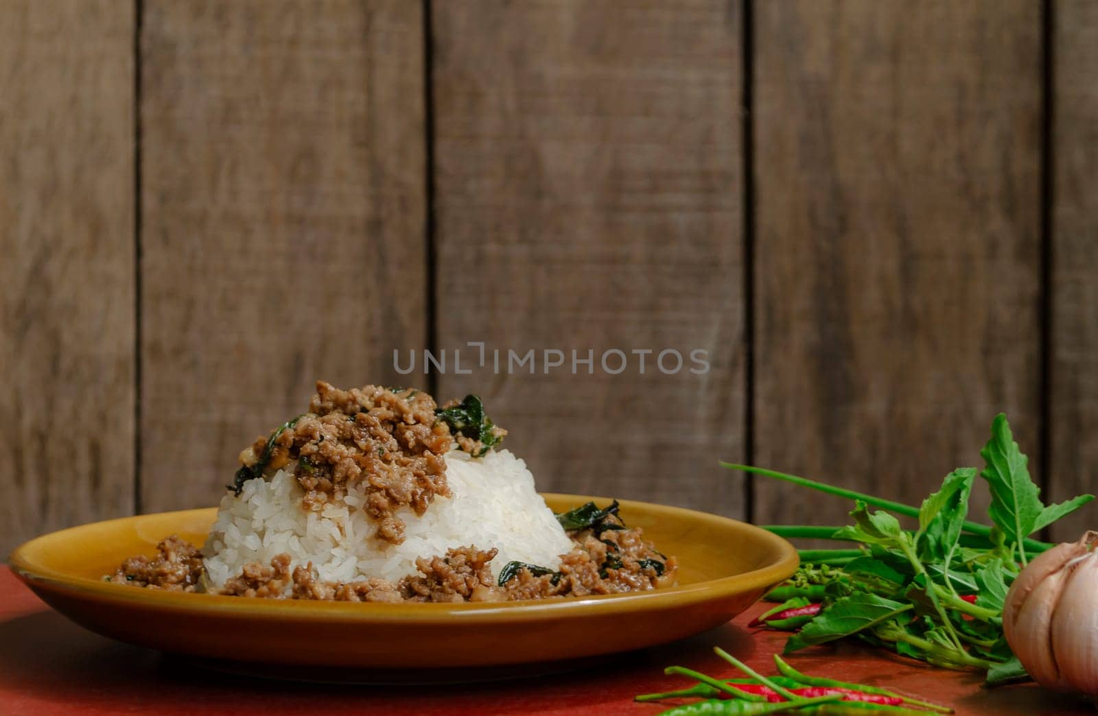 Minced pork with basil over rice is a Thai food that is popular among Thai people because it is delicious and easy to eat