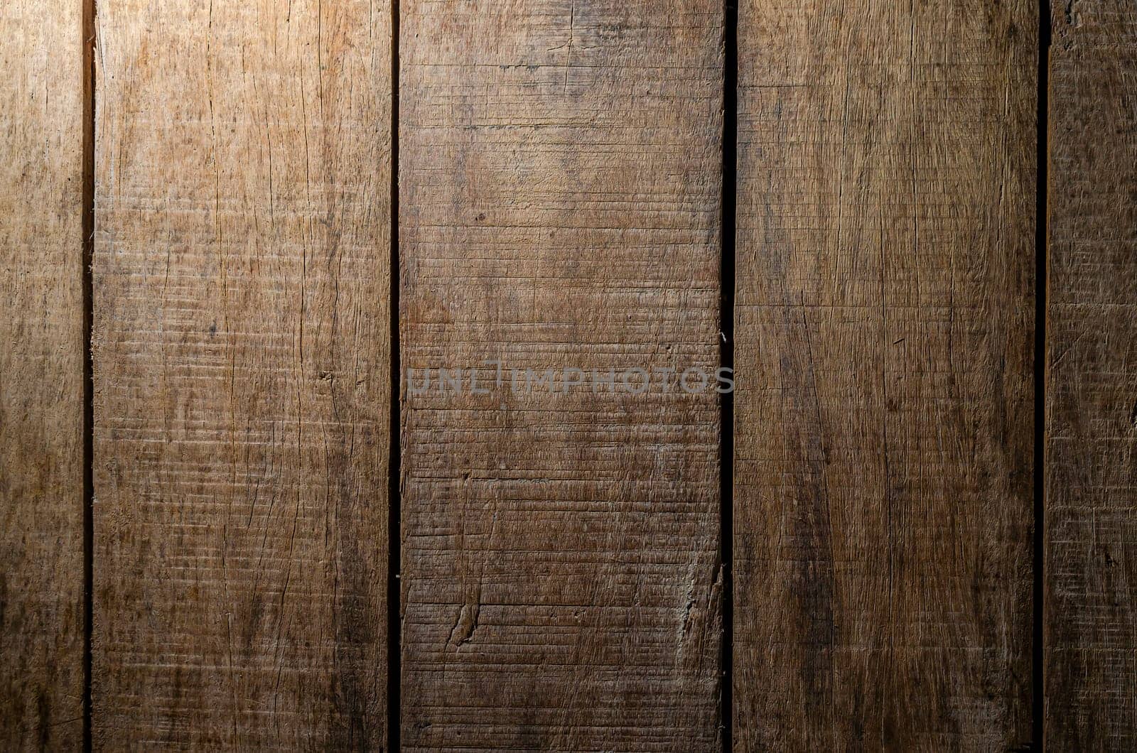 Empty wooden desk table and bag, Old brown dark wood wall texture and pattern background for design, Still life style.