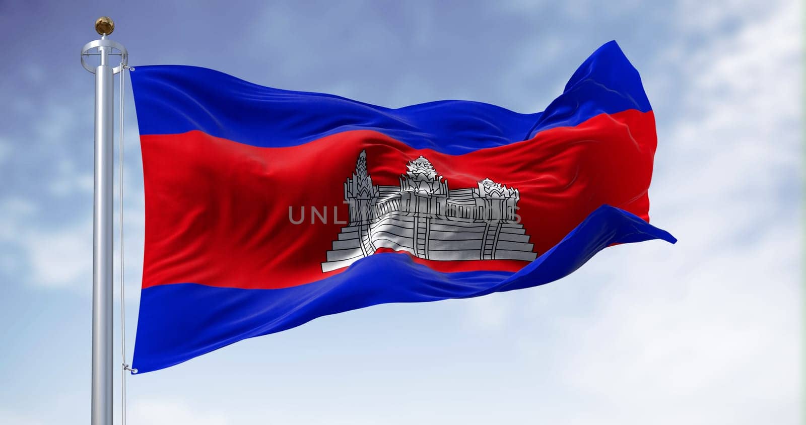 Cambodia national flag waving on a clear day. Three bands, blue, double red, blue, with Angkor Wat in white centered on the red. 3d illustration render. Fluttering fabric