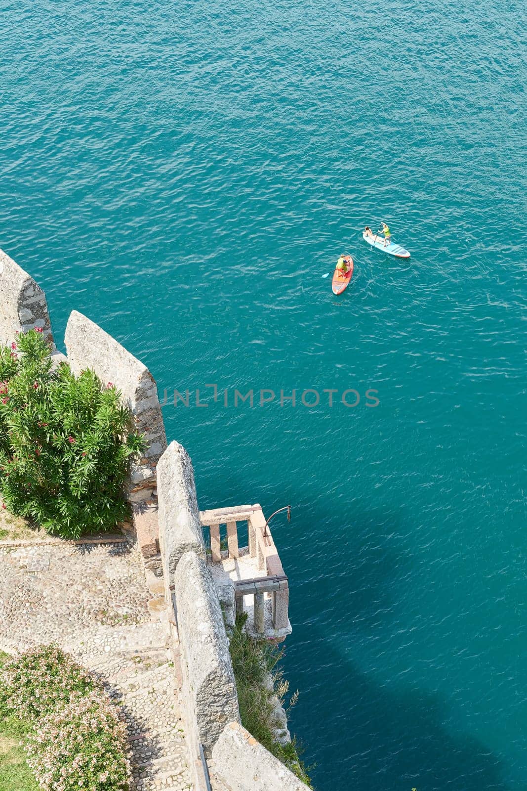 View from the tower of the Scaliger Castle, Castello Scaligero in Malcesine in Italy to Lake Garda below