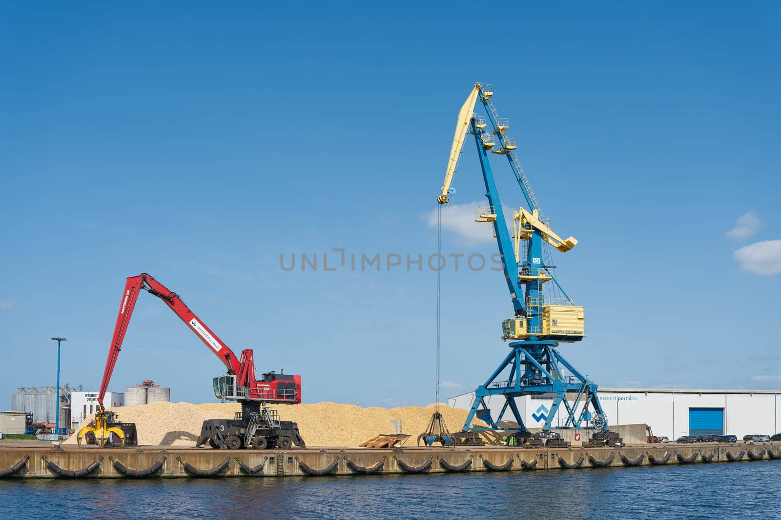 Cranes in the port of Wismar in Germany for loading and unloading ships