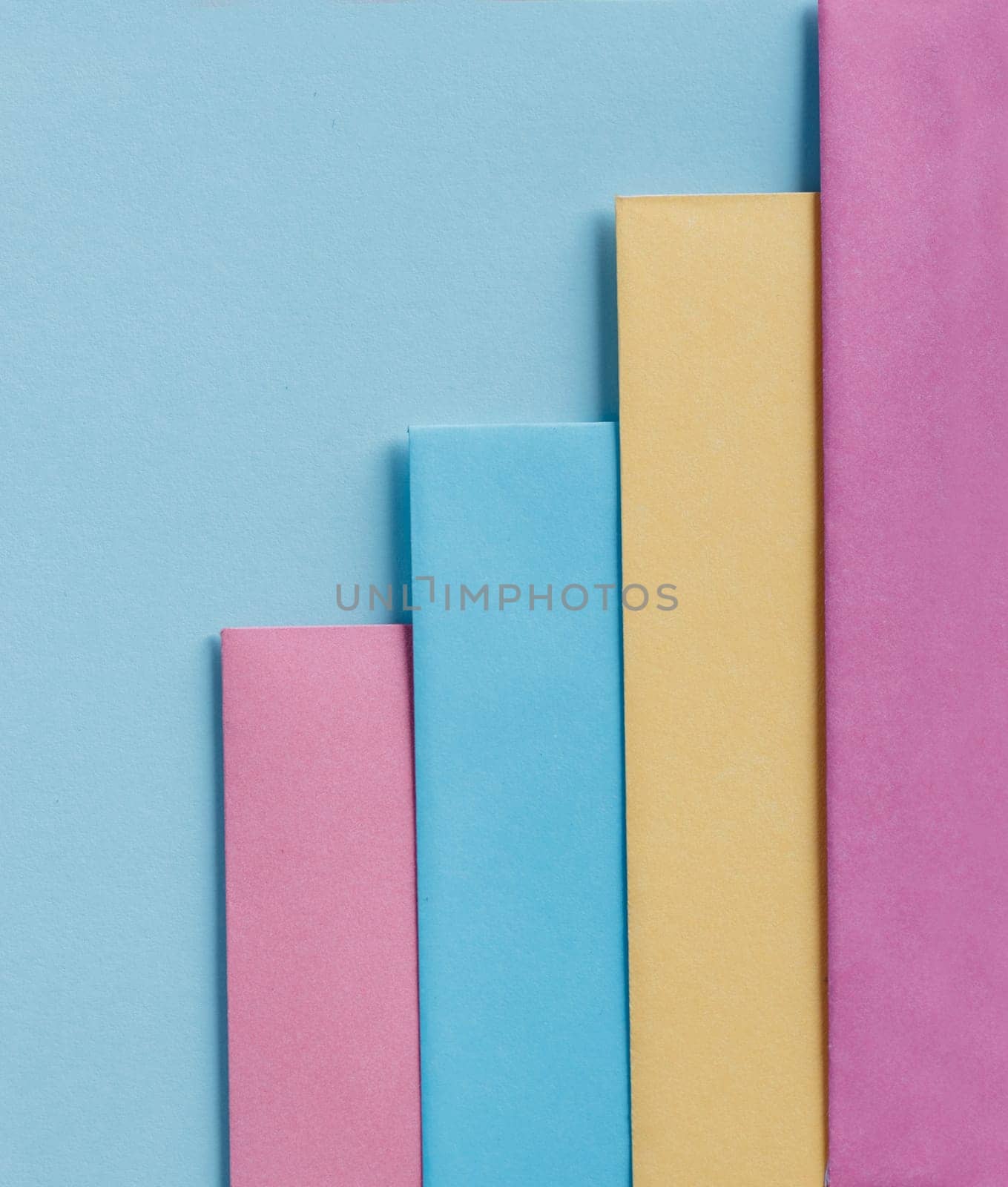 Trendy pastel colors in geometry shape flat lay. Colorful rainbow paper creative linear background. Abstract minimal vivid art design.