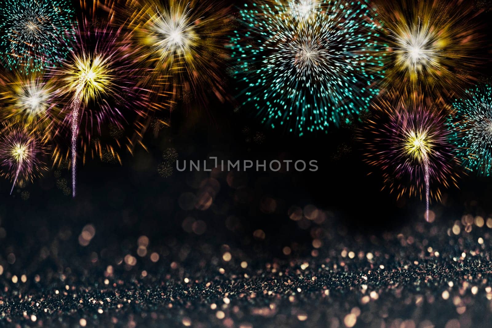 Abstract sparkling fireworks design background for new year party and christmas celebration poster. Festive fire work light on dark bokeh backdrop with copyspace.