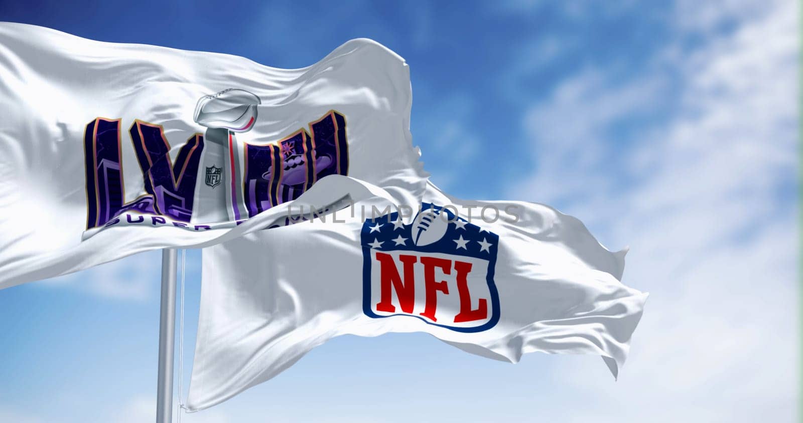 Paradise, US, June 20 2023: 58th Super Bowl and NFL flags waving. The game is scheduled to be played on Feb 11, 2024 in Paradise, Nevada. Illustrative editorial 3d illustration render. Selective focus