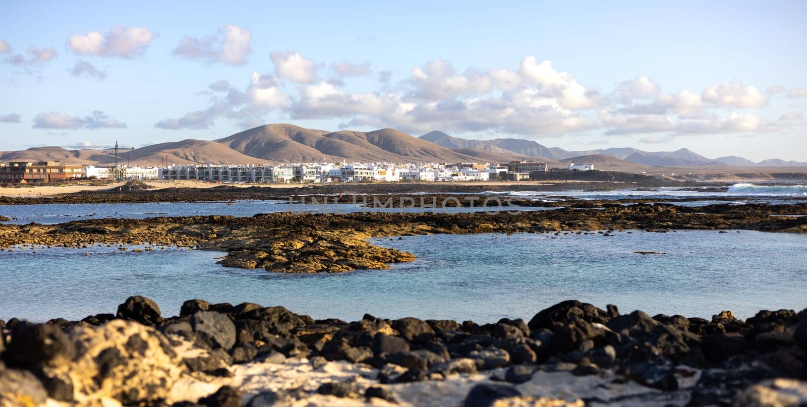 Panoramic view of El Cotillo city in Fuerteventura, Canary Islands, Spain. Scenic colorful traditional villages of Fuerteventura, El Cotillo in northen part of island. Canary islands of Spain.