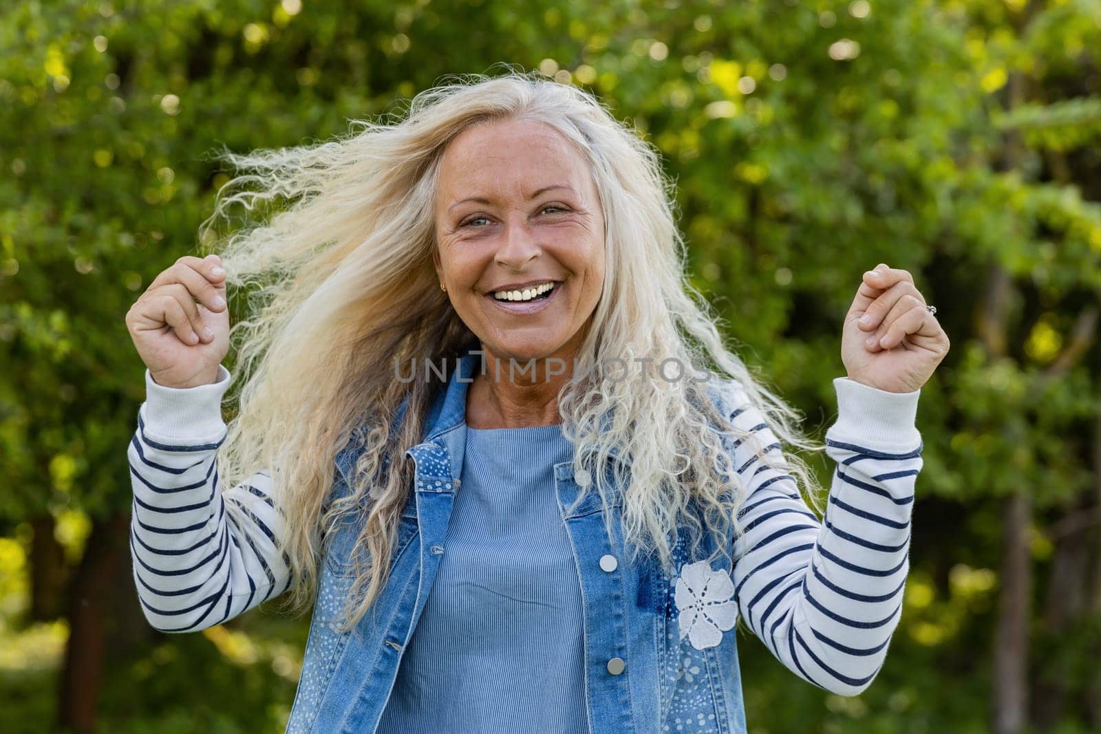 Portrait from happy caucasian woman with log hair
