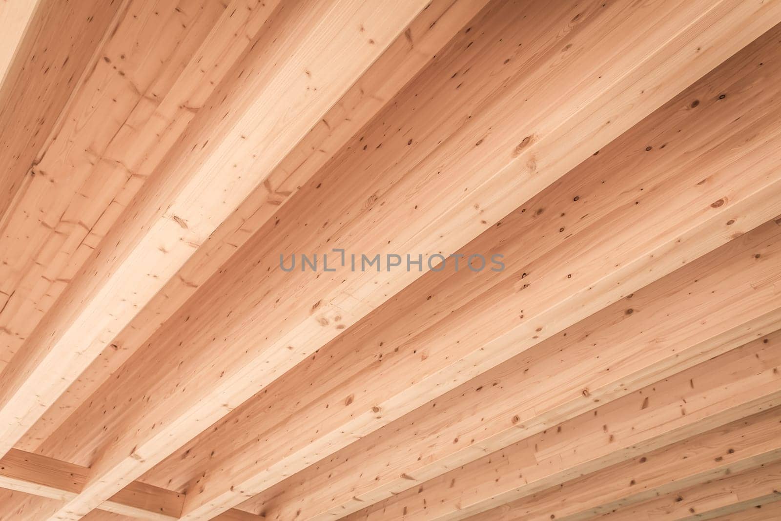 Detail of wooden roof with beams, background
