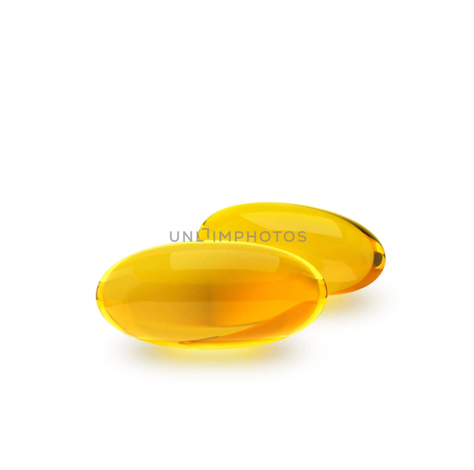 Golden oil capsule of vitamin A, E, Omega 3 or collagen. of medical pill with fish fat or organic cosmetic oil on white background