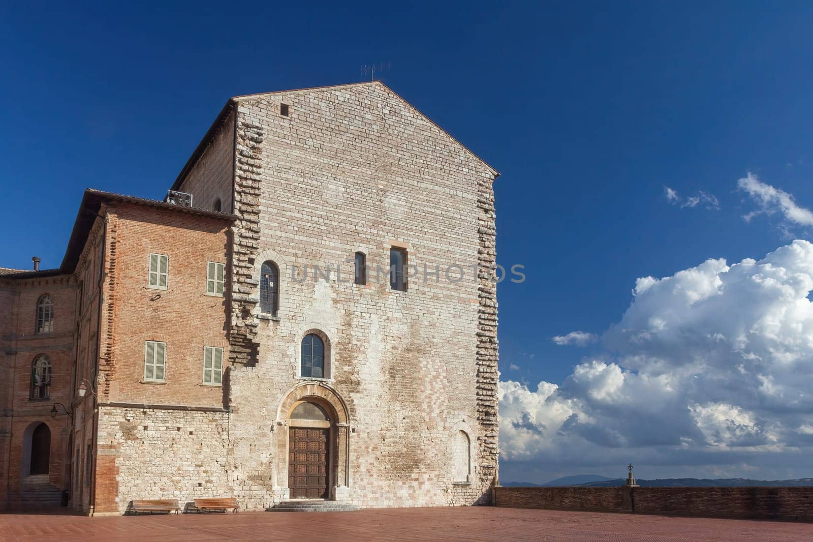 Empty Main Square and the City Hall in the town of  Gubbio. Umbria. Italy.  Horizontally.