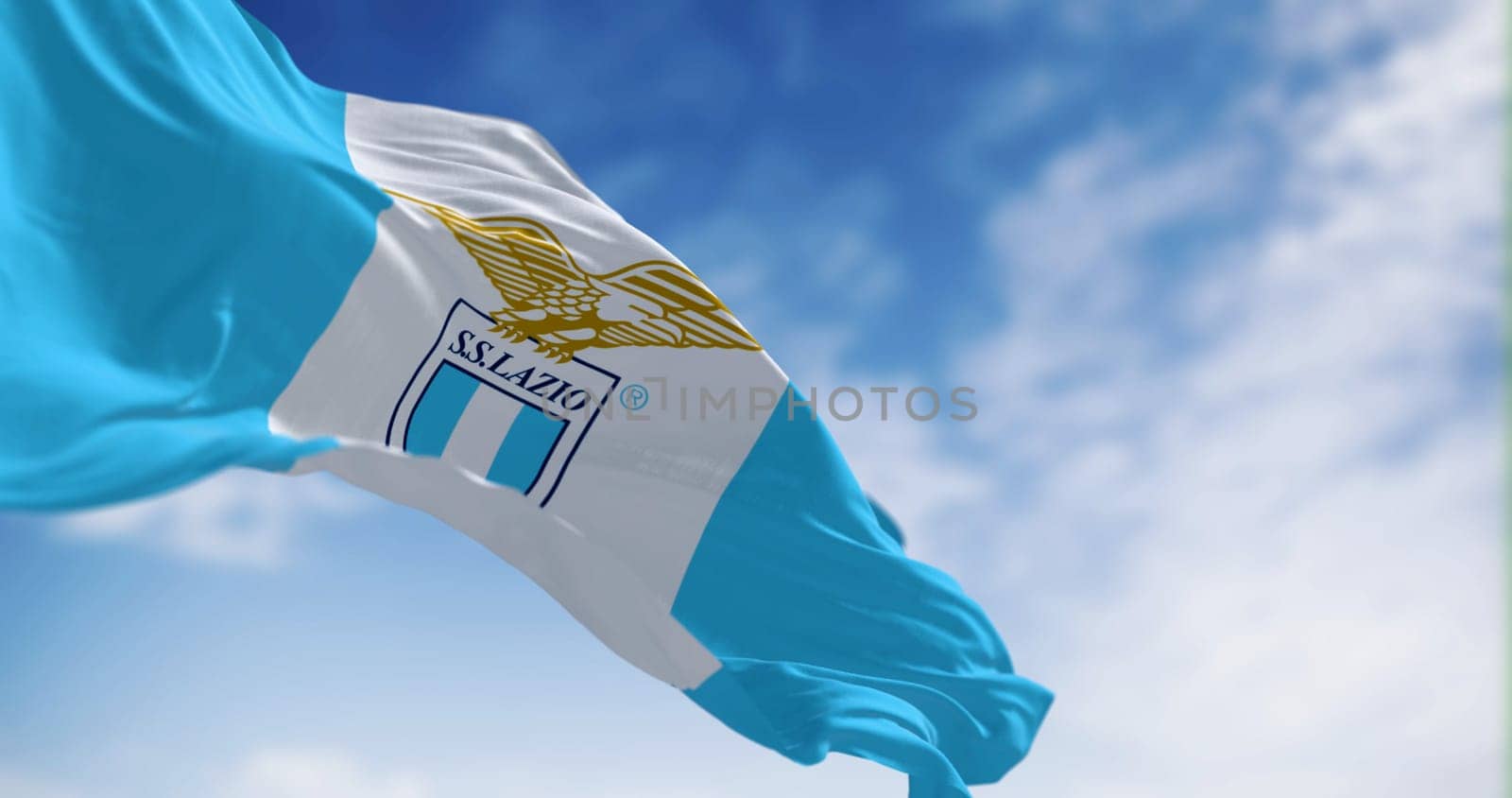 Rome, Italy, Sept. 2 2023: SS Lazio flag waving on a clear day. Professional football club based in Rome. Illustrative editorial 3d illustration render. Rippled fabric. Selective focus