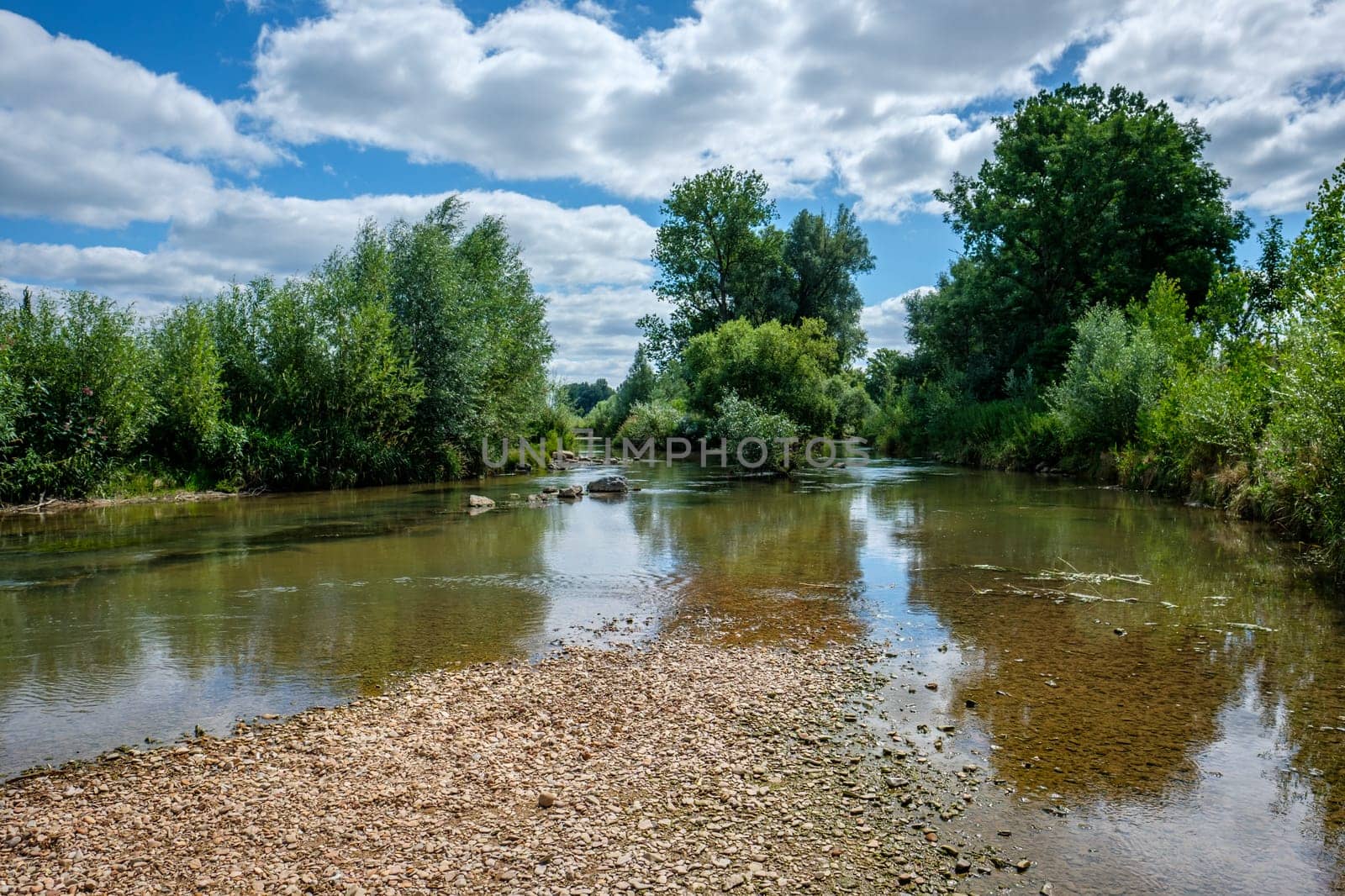 German river Rems with pebbles and trees