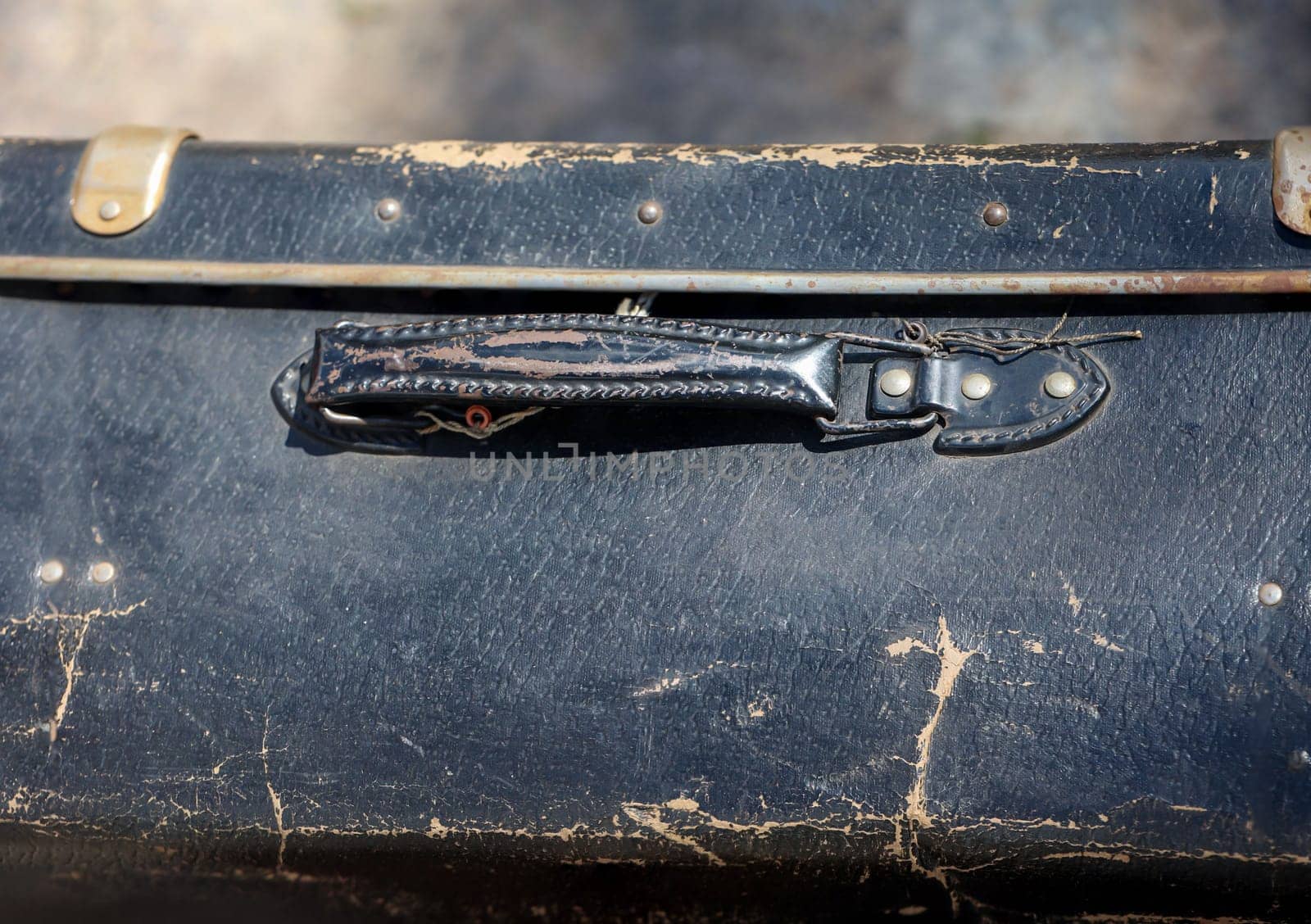 Details of an old suitcase as it was used 50 years ago.