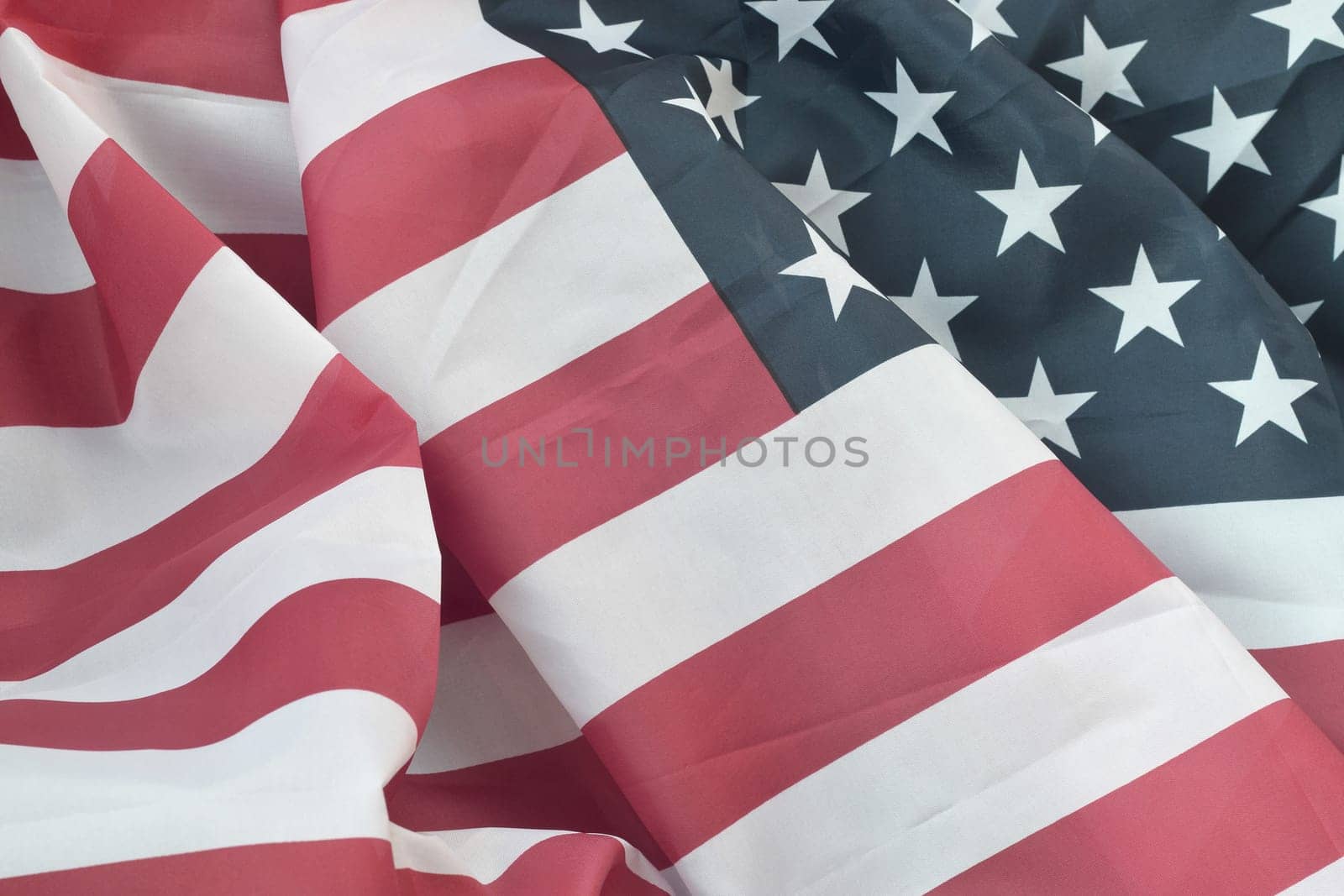 United States of America waving flag with many folds. Patriotic background for USA Memorial Day design