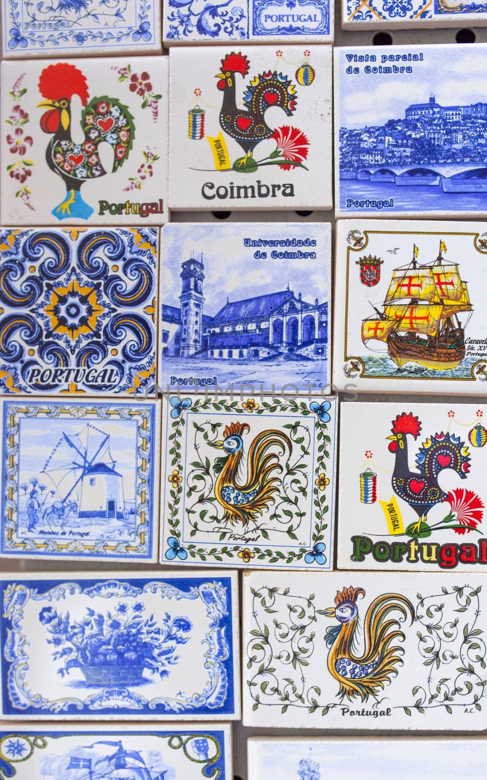 Coimbra, Portugal - Sept 6th 2019: Glazed tiles magnets with traditional portuguese motifs, Coimbra Old Town, Portugal