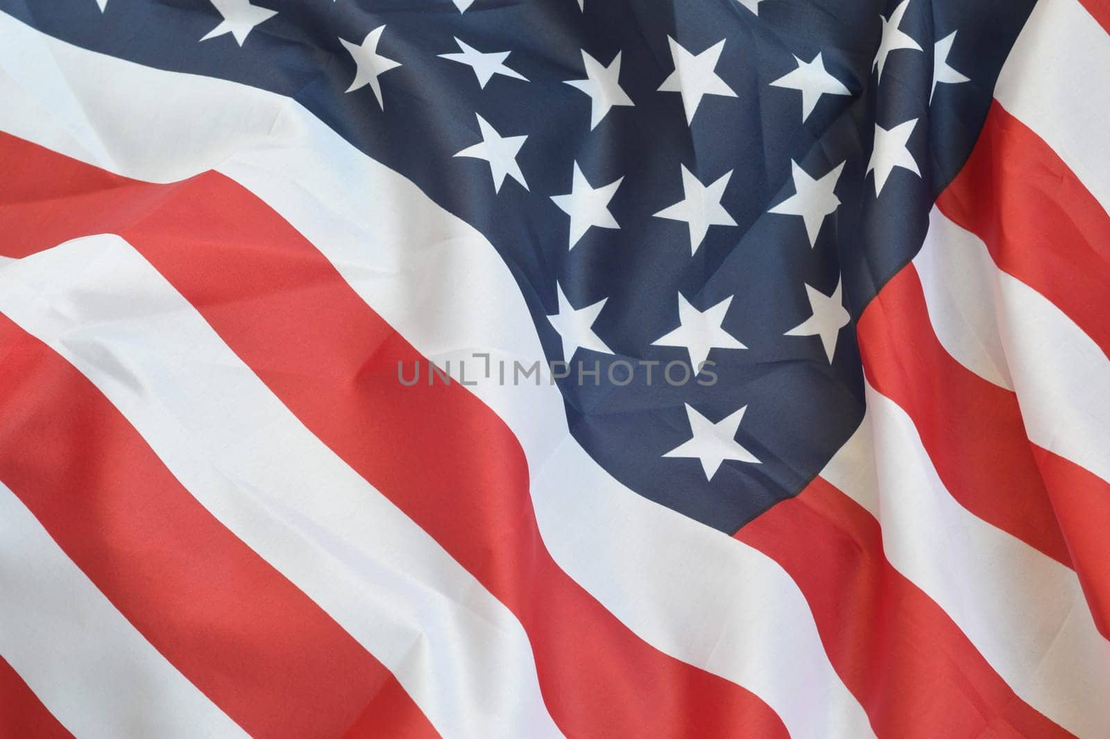 United States of America waving flag with many folds. Patriotic background for american holidays design