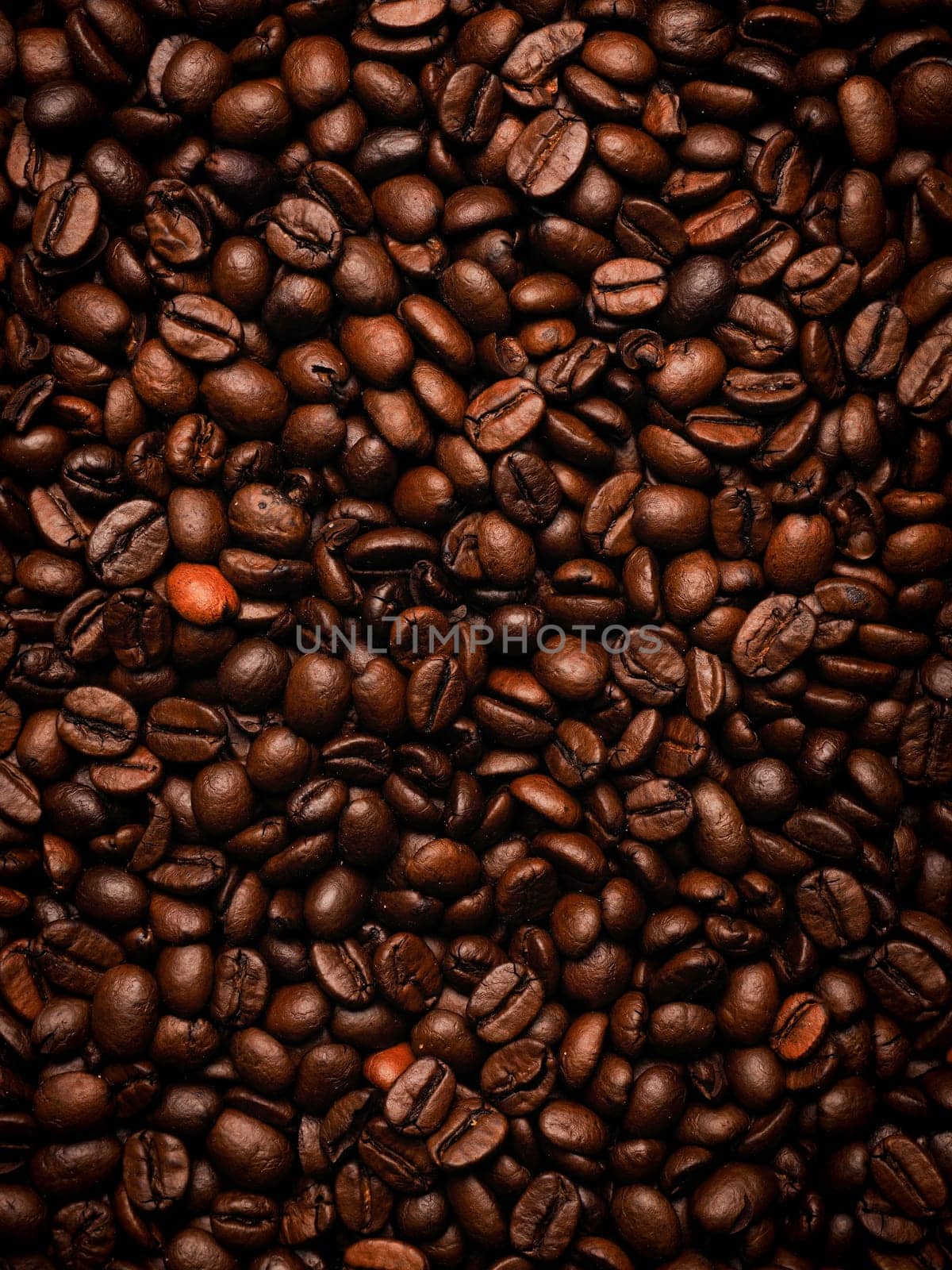 Beautiful texture of roasted organic coffee beans using as food and drink background