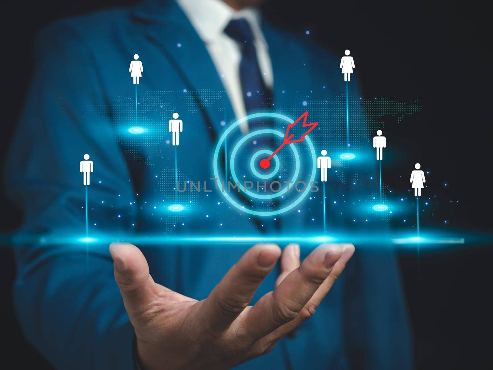 Businessman shows dart board in selecting business target group, target customers, buyers, customer behavior concept, marketing plan and strategy, personal marketing, customer centric strategy.