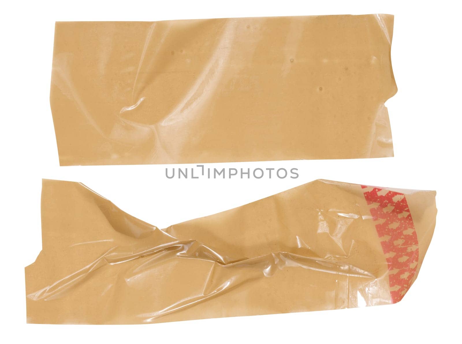 Crumpled piece of brown adhesive cellophane tape, packaging material