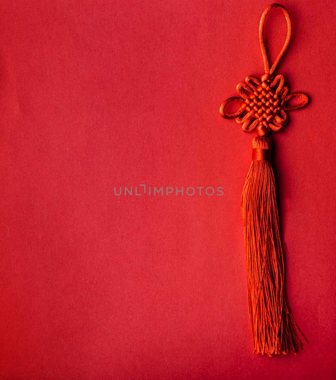 Chinese new year background. Lunar new year symbol with red silk fabric on paper backdrop. Traditional asian celebration 2020.