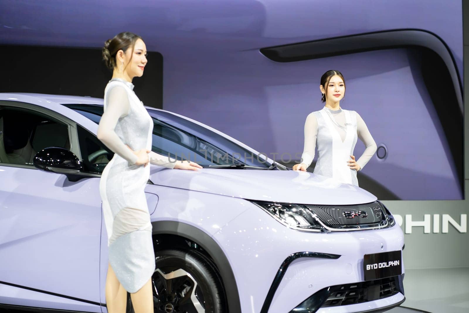 Nonthaburi, Thailand - MAR 26, 2023 Unidentified model poses with a car at The 44th Bangkok international motor show 2023 at IMPACT Arena, Muang Thong Thani, Nonthaburi, Thailand.