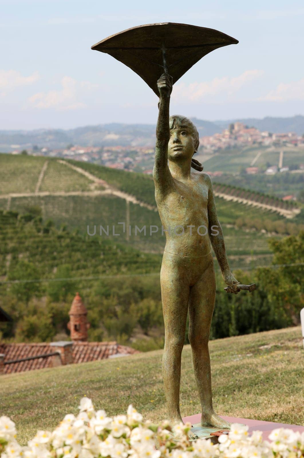 Grinzane Cavour, Italy - Sept 8, 2022: Open air art installation with sculptures by Sergio Unia in the garden of Grinzane Cavour Castle. Piedmont, Italy