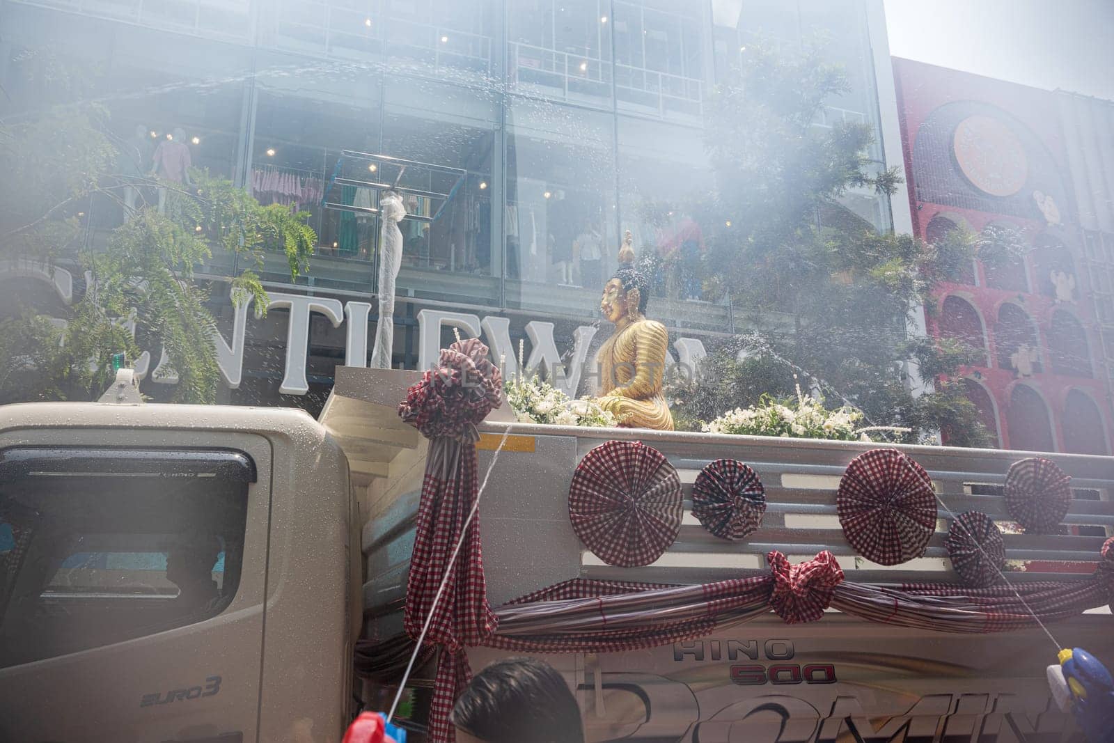 Siam Square, Bangkok, Thailand - APR 13, 2023 Songkran Festival, The short action of people joins celebrations of the Thai New Year or Songkran in Siam Square Bangkok, Thailand.