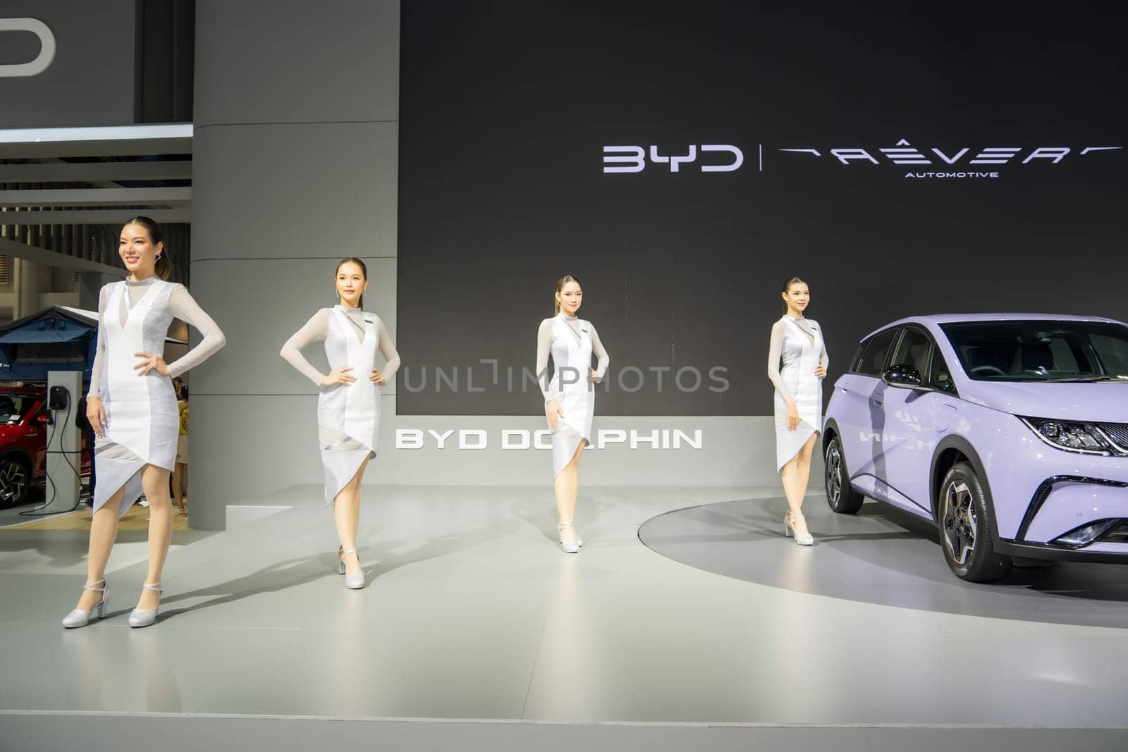 Nonthaburi, Thailand - APR 2, 2023 Unidentified model poses with a car at The 44th Bangkok international motor show 2023 at IMPACT Arena, Muang Thong Thani, Nonthaburi, Thailand.
