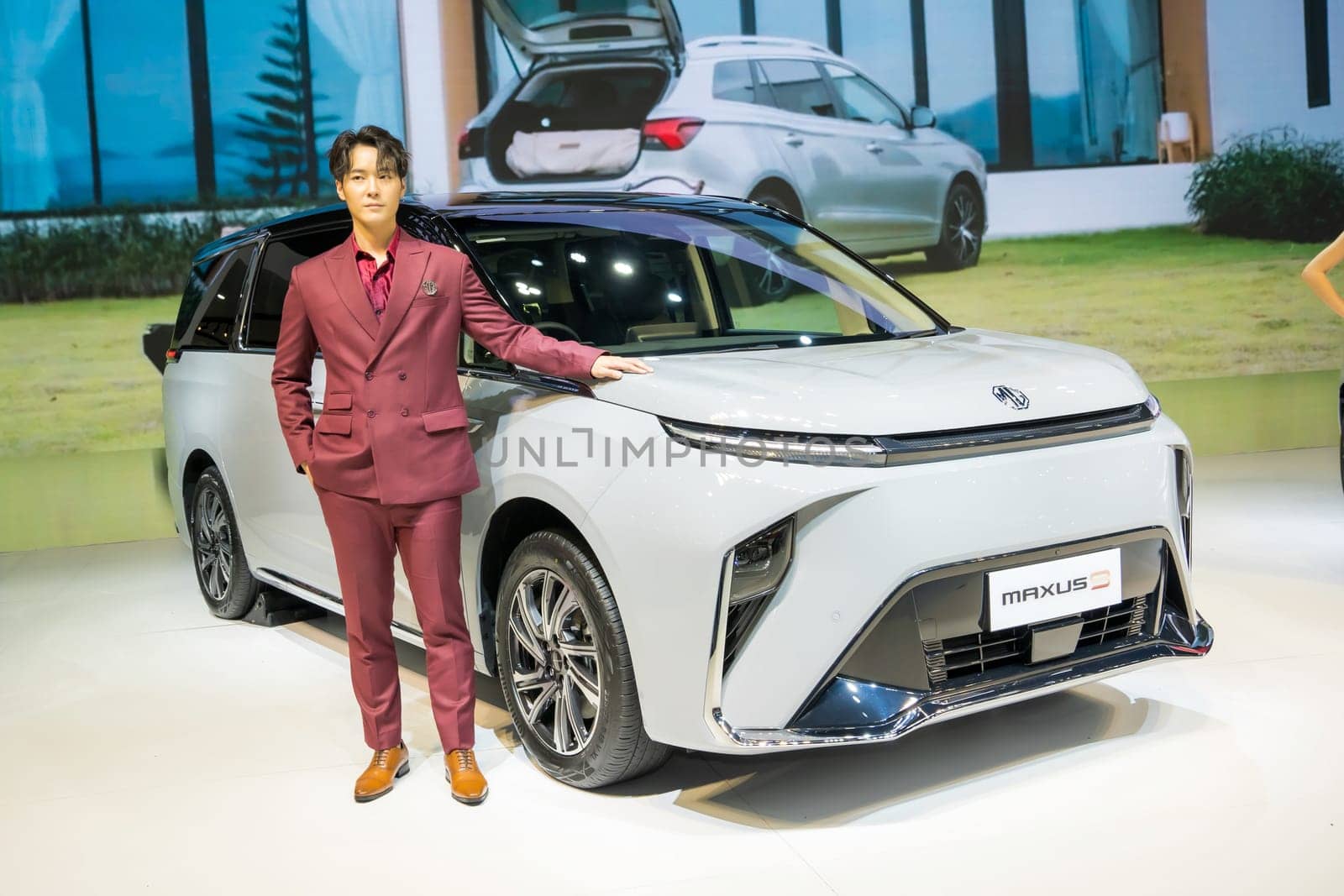 Nonthaburi, Thailand - APR 2, 2023 Unidentified model poses with a car at The 44th Bangkok international motor show 2023 at IMPACT Arena, Muang Thong Thani, Nonthaburi, Thailand.