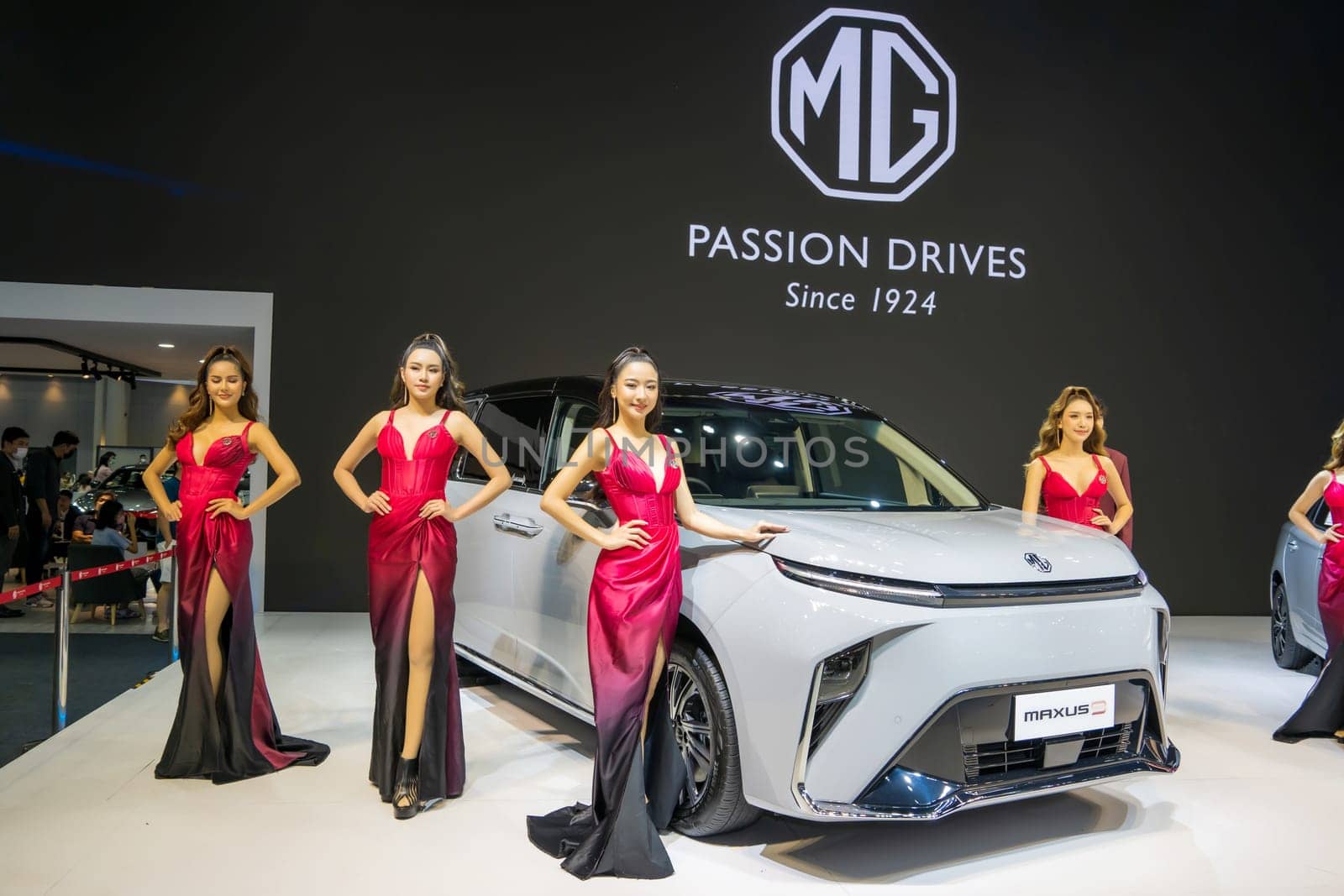 Nonthaburi, Thailand - APR 2, 2023 Unidentified model poses with a car at The 44th Bangkok international motor show 2023 at IMPACT Arena, Muang Thong Thani, Nonthaburi, Thailand.