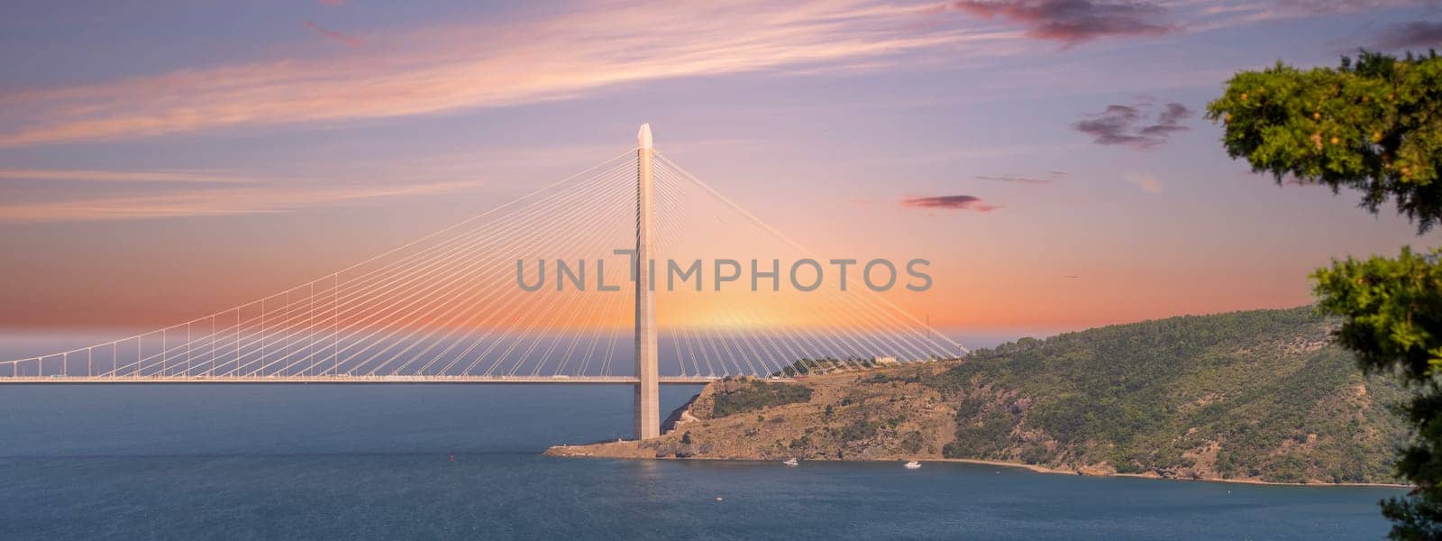 Yavuz Sultan Selim Suspension Bridge after sunrise, a suspension bridge that spans the Bosphorus Strait between Europe and Asia, located in Istanbul, Turkey