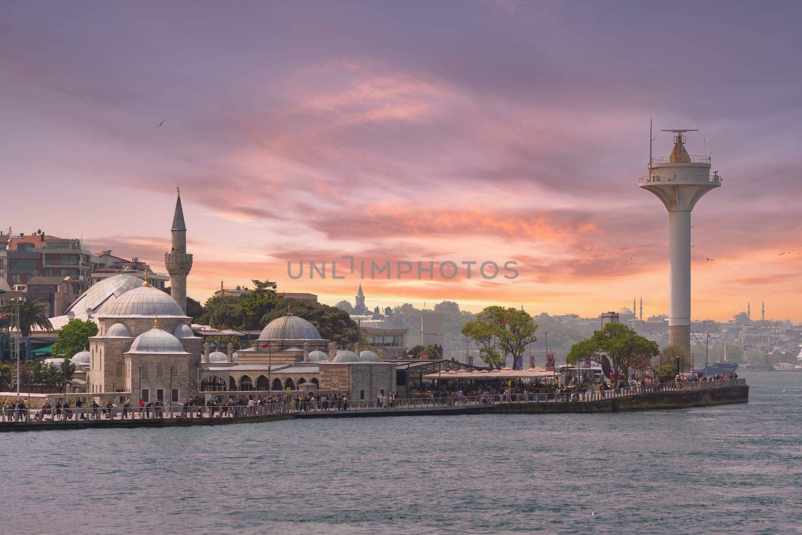 Istanbul, Turkey - May 8, 2023: Semsi Pasha Mosque, an Ottoman mosque on the coast of Uskudar district, on the Asian side of Bosphorus Strait before sunset, designed by Ottoman imperial Mimar Sinan