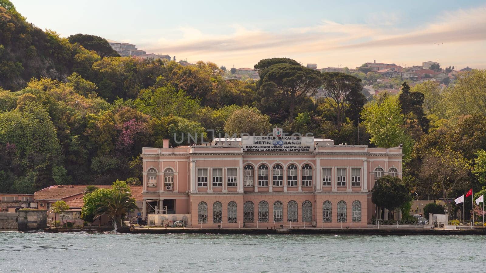 Metin Sabanci Baltalimani Bone Diseases Training and Research Hospital, a modern hospital building located by the Bosphorus Strait, Istanbul, Turkey and surrounded by lush green forest and water