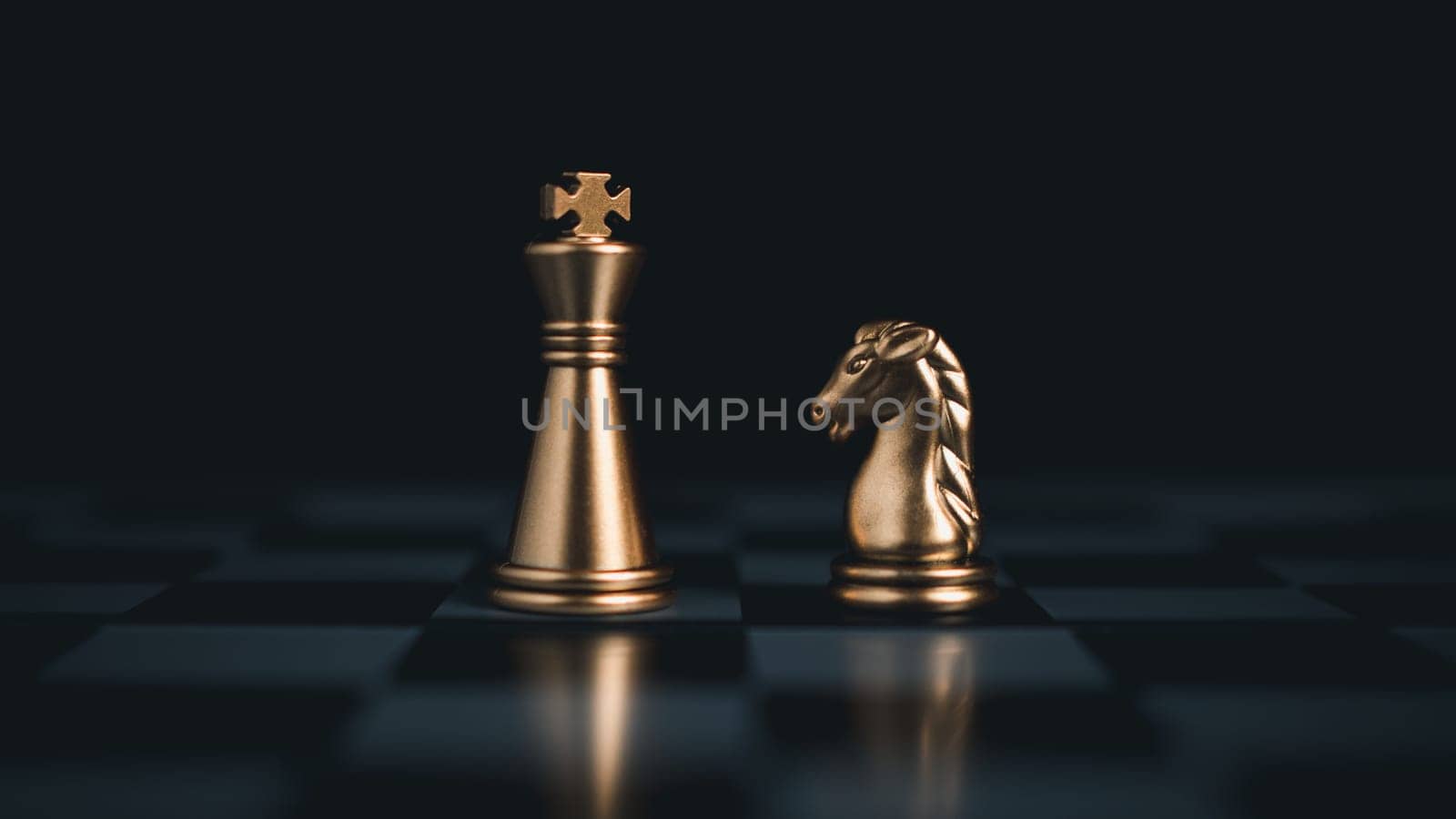 Gold and silver chess pieces in chess board game for business comparison. Leadership concepts, human resource management concepts.