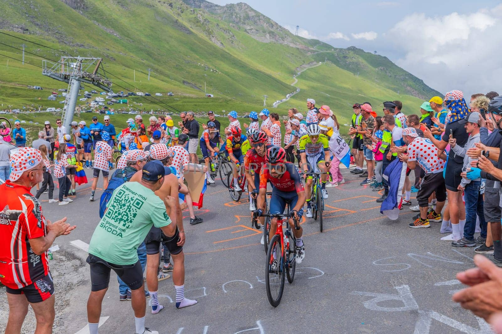 Col du Tourmalet, France - July 06 2023: Riders climbig the road to Col du Tourmalet in Pyerenees mountains during the stage 6 of Le Tour de France 2023.