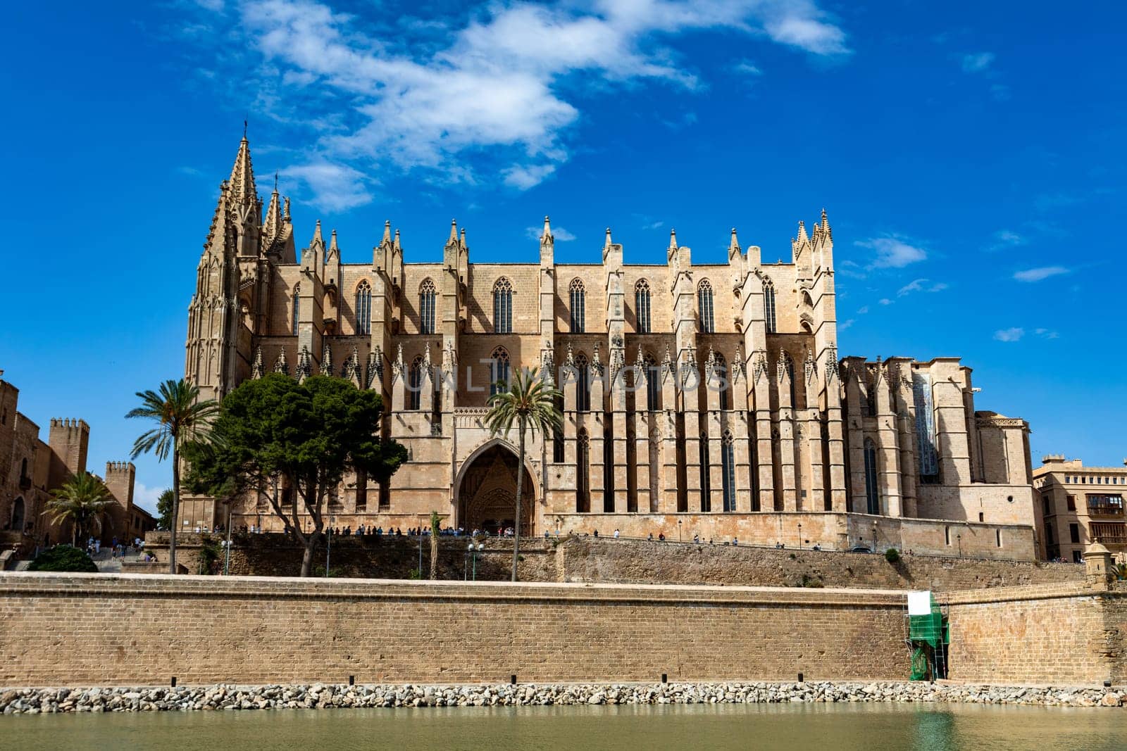 Gothic medieval cathedral La Seu and Royal Palace of La Almudaina. Capital city Palma de Mallorca. Balearic Islands Spain. Travel agency vacation concept.