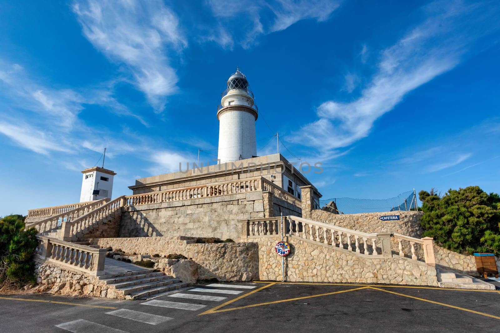 The beautiful lighthouse on the cliff of Cap Formentor. Balearic Islands Mallorca Spain. Vacation concept. One of the most visited landmark in Mallorca