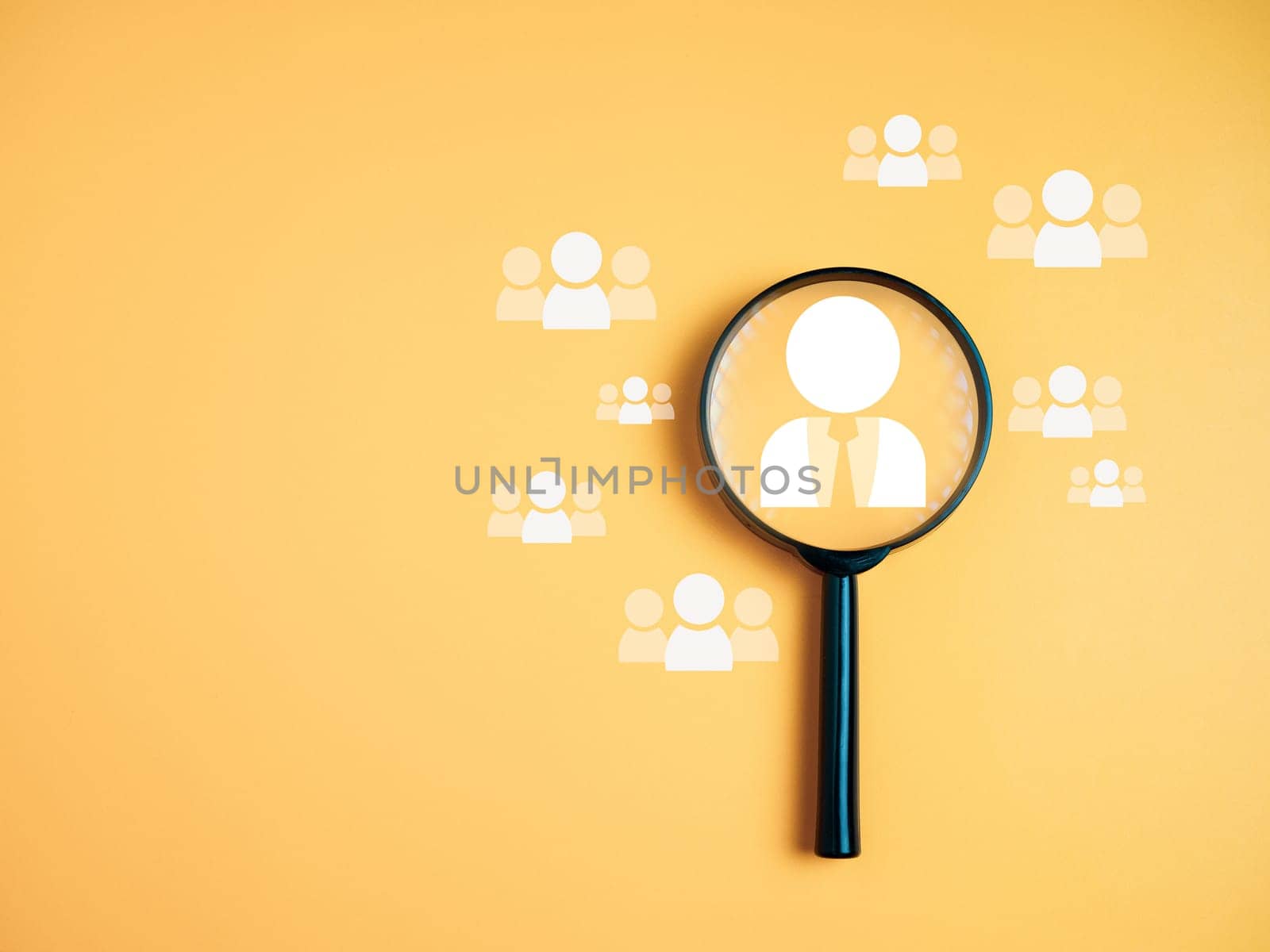 Team management concepts, human resources, recruitment concepts, human resource management or human resource management concept, Manager icon in magnifying glass placed on yellow background.