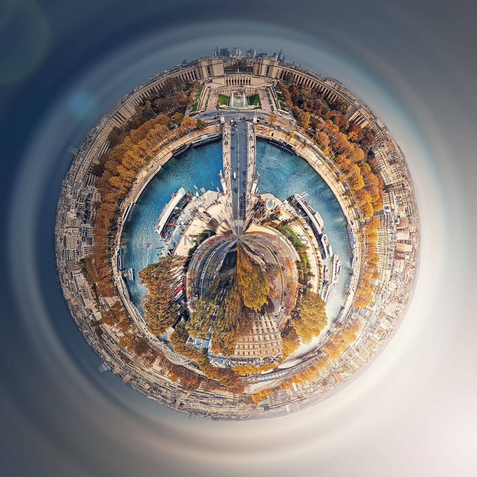 Aerial Paris as a micro planet in space. Sightseeing city panorama in shape o a globe with view to Seine river, Trocadero area and La Defense metropolitan district, France