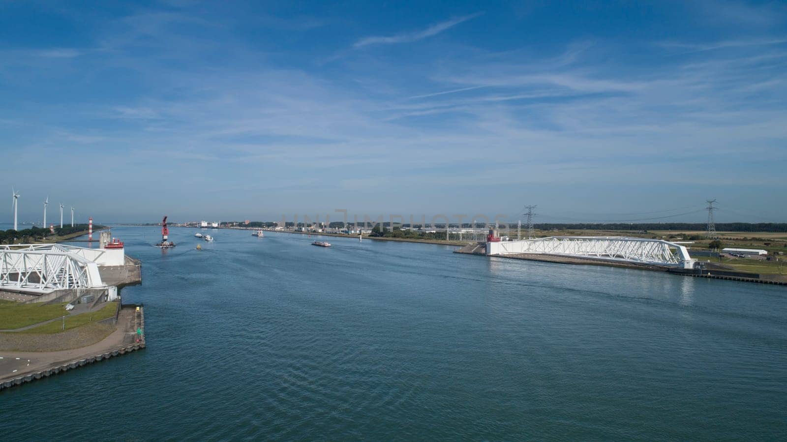 Aerial picture of Maeslantkering storm surge barrier on the Nieuwe Waterweg Netherlands it closes if the city of Rotterdam is threatened by floods and is one of largest moving structures on earth