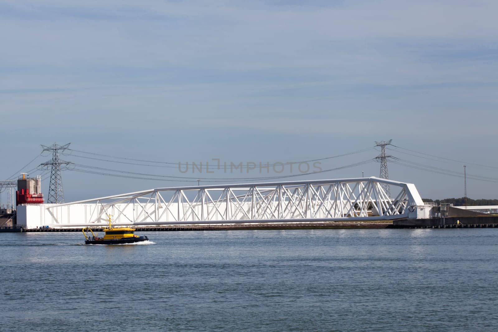 Aerial picture of Maeslantkering storm surge barrier on the Nieuwe Waterweg Netherlands it closes if the city of Rotterdam is threatened by floods and is one of largest moving structures on earth