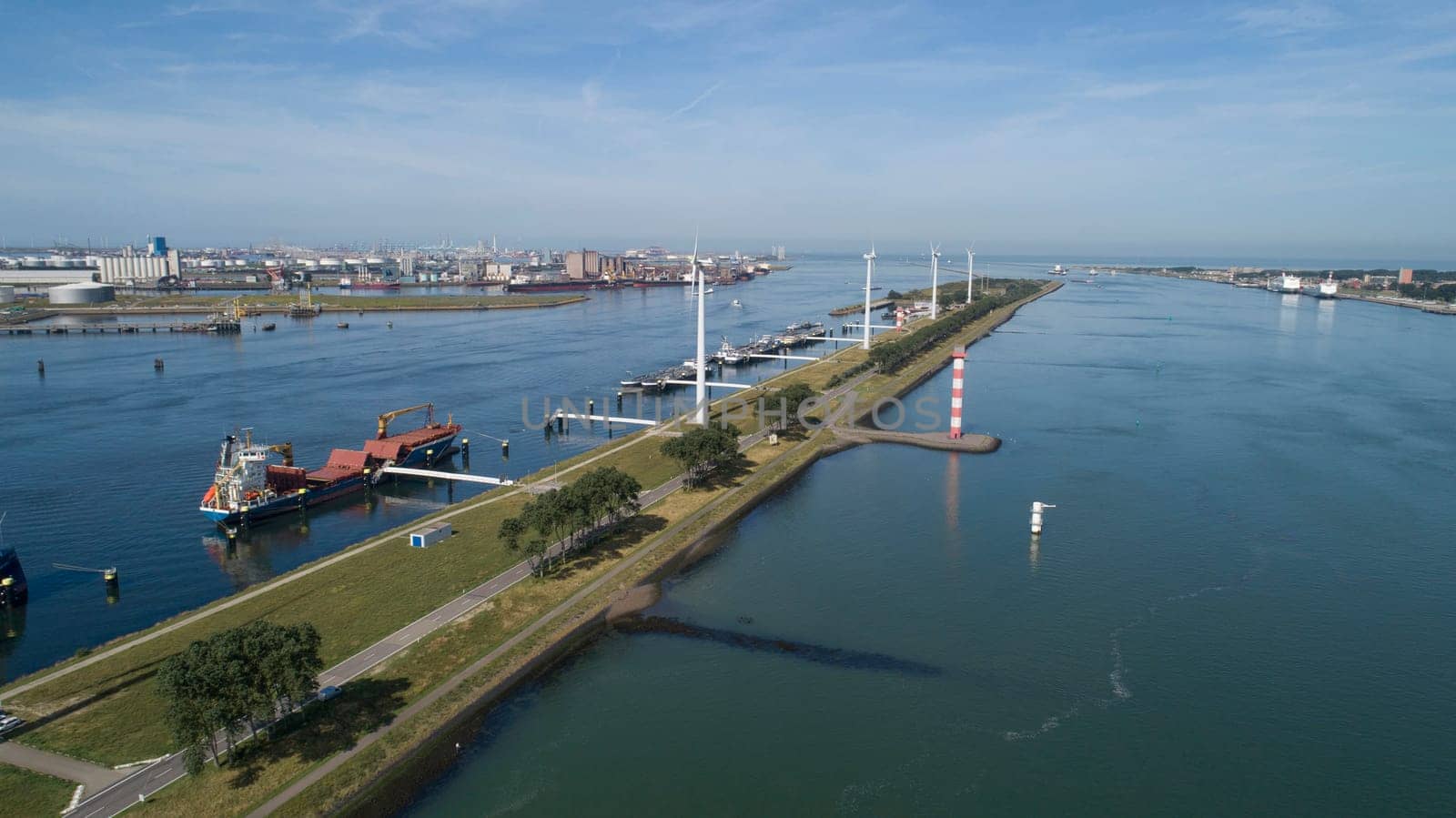 Port of Rotterdam. Botlek. Oil refinery plant from industry zone, Aerial view oil and gas industrial, Refinery factory oil storage tank and pipeline steel