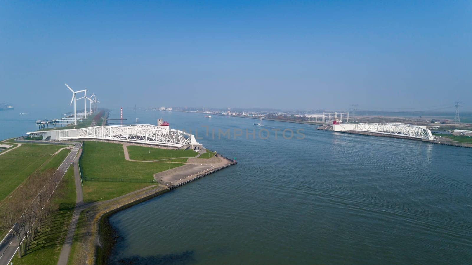 Aerial picture of Maeslantkering storm surge barrier on the Nieuwe Waterweg Netherlands it closes if the city of Rotterdam is threatened by floods and is one of largest moving structures on earth