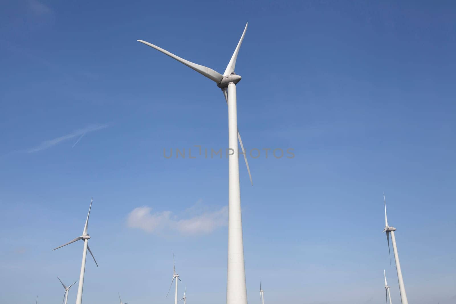Windmill for electric power production. big windmill generating pure energy.
