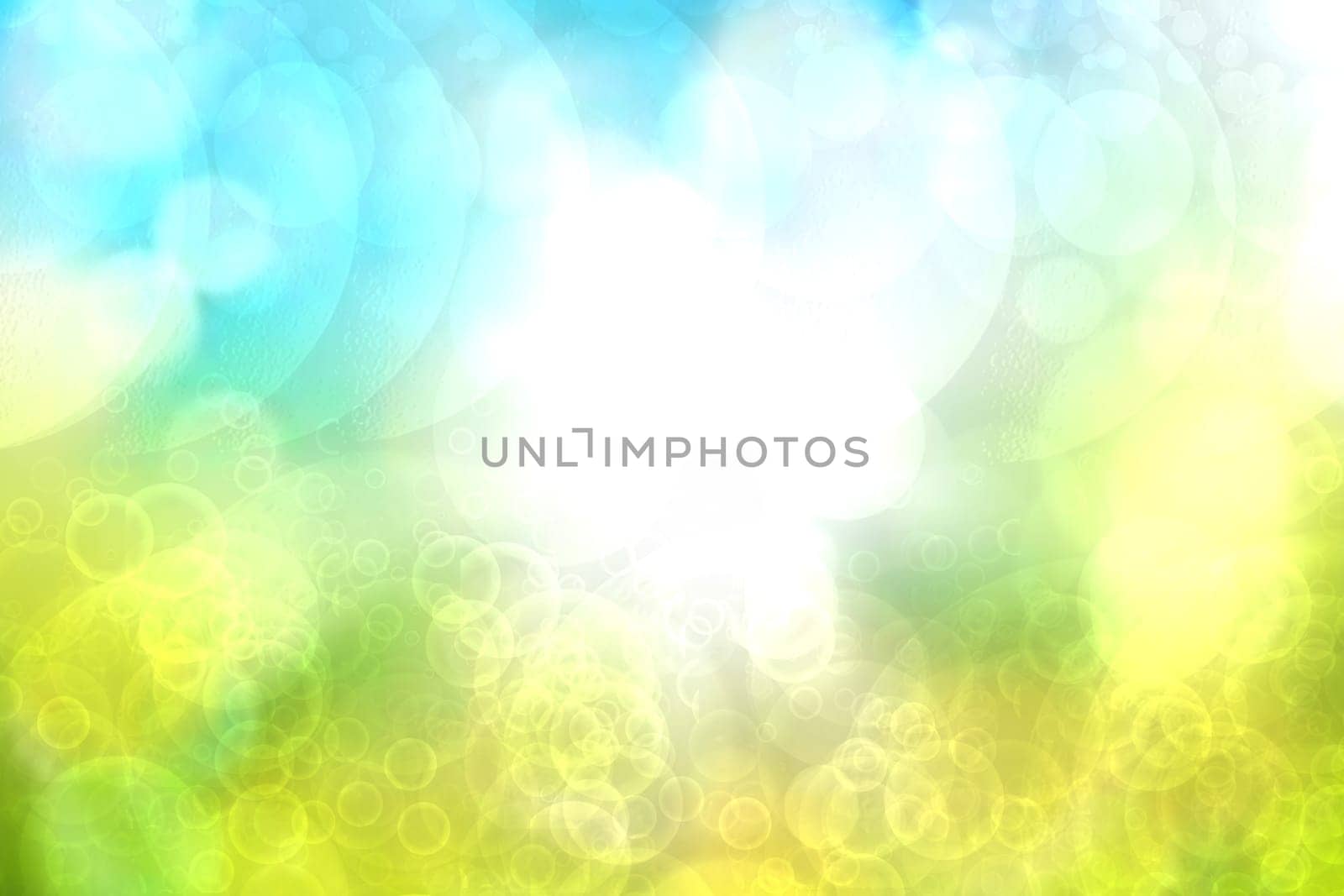 Abstract gradient light blue turquoise yellow green shiny blurred background texture with circular bokeh lights. Beautiful fresh backdrop. Space for design.