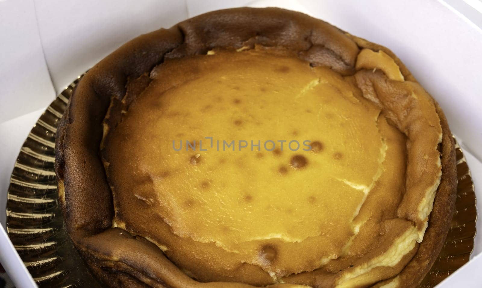 Detail of sweet cheese-based dessert, unhealthy food, diet