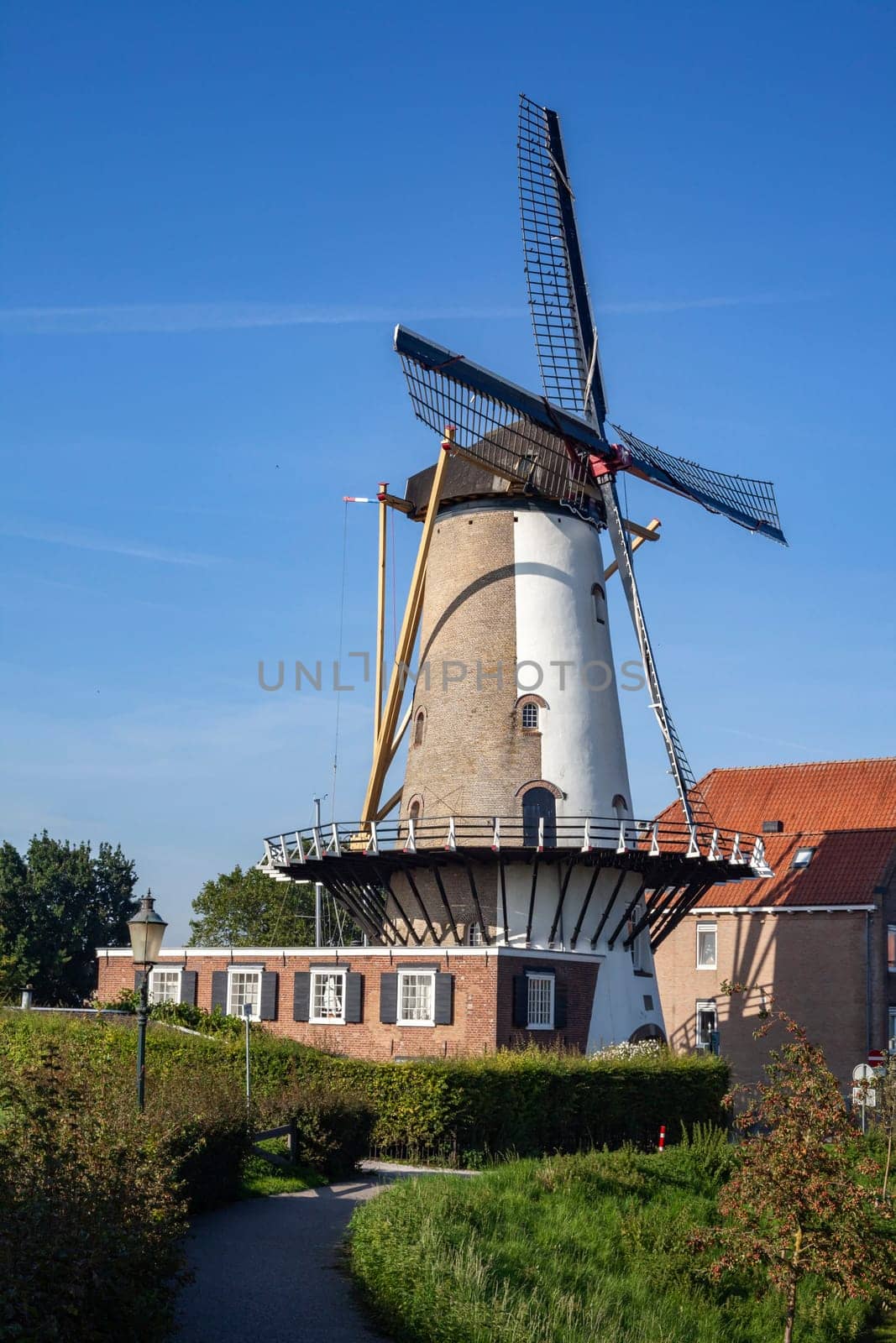 Windmill farm river landscape. Windmill farm scene. Village windmill farm river. Windmill farm river view