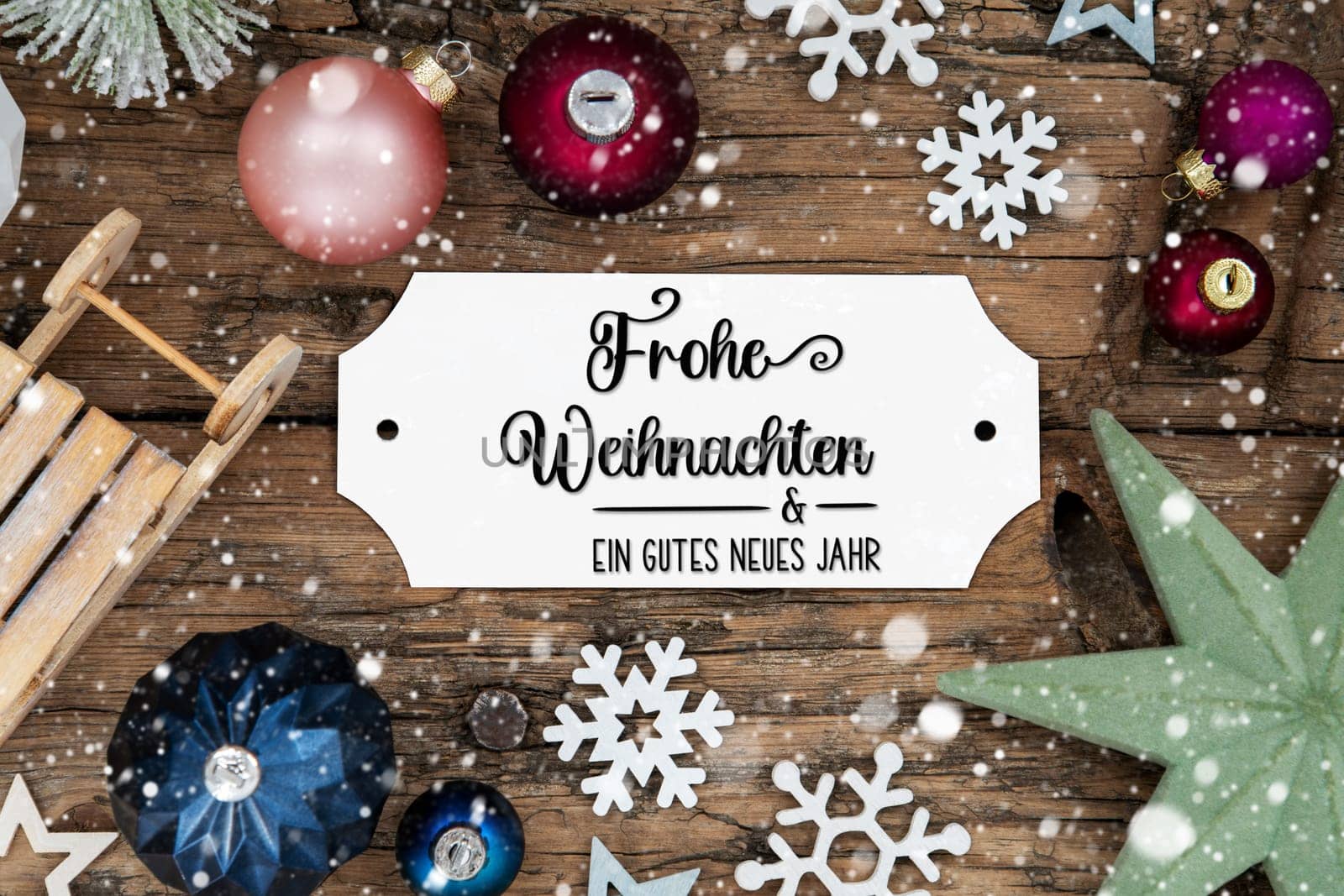Festive Christmas Decoration, Christmas Background With Snowfall And Sign With German Text Frohe Weihnachten Und Ein Gutes Neues Jahr, Which Means Merry Christmas And Happy New Year In English